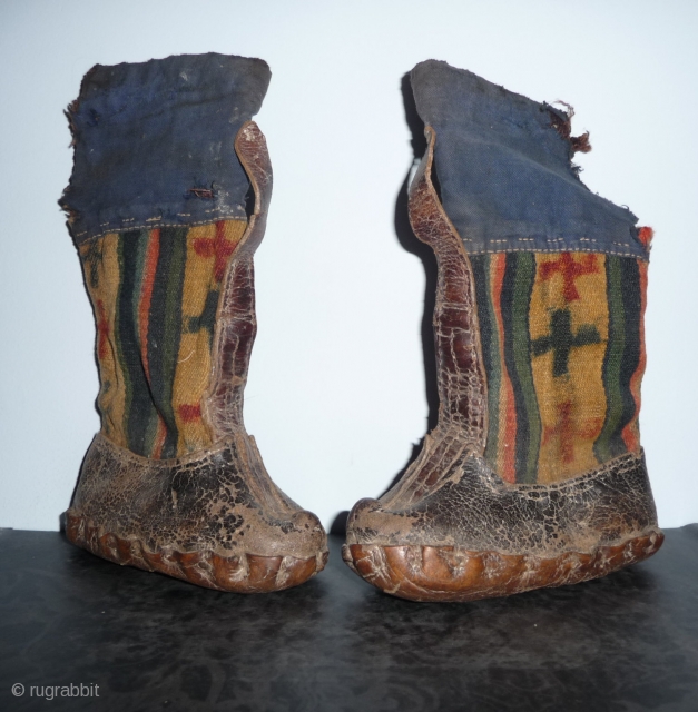 rare pair of tibetan child boots. leather and pulo wool.tibet, early 20th c. or before.                  