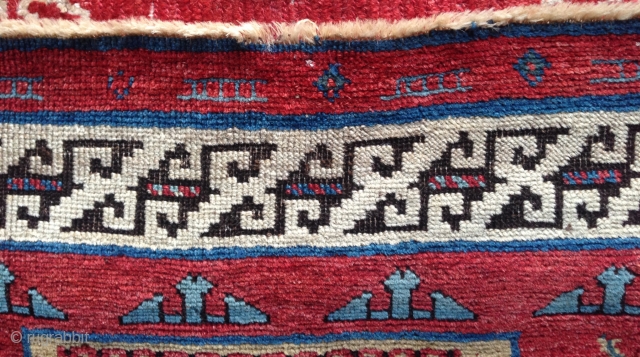 19th century small caucasian rug with bold  color contrast and unusual design details..                   