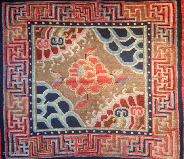 wonderful tibetan mat from first third of the 20th century. in superb complete condition with a nicely patinated surface. some rest of the felt frame at the ends which will be easily  ...