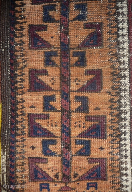 beautiful baluch prayer rug with prayer wear.attrativ hand panel and turkmen field design with a strong reciprocity effect.lots of interesting small amulets. all natural colors with very nice apricot ground color.silk highlights  ...