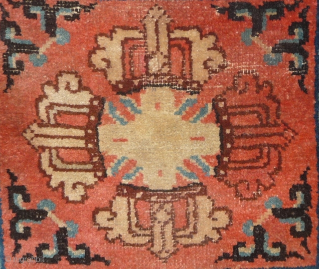 only late 19th c dorje temple sitting runner fragment, only 6 rows at botton end rewoven.
please note the color change of the east branch of the dorje. only for those who are  ...