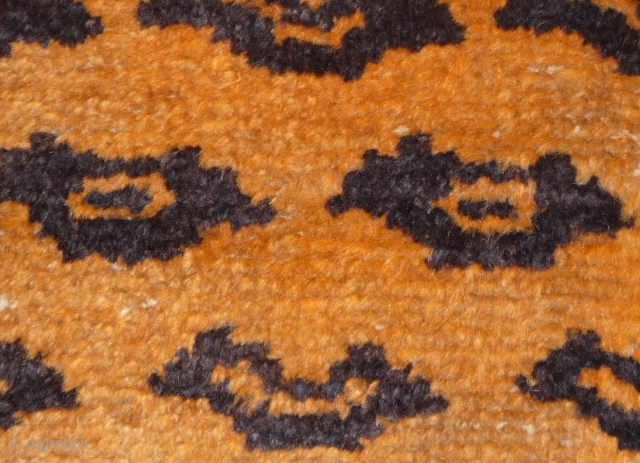 not a tibetan weaving but this small tiger rug was intented for a tibetan monastery to be hung in a door way or as pillar decoration. despite of its late 19thc or  ...