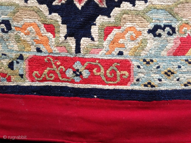 superb tibetan lama seating mat with a bold lotus center. very good condition. first quarter of the 20th century.. rare!             