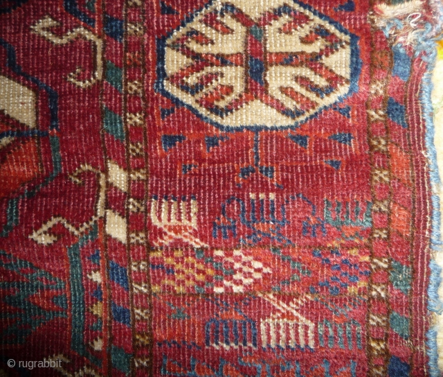 Early tekke main carpet  fragment (cut and shut at top, missing 1 row of guls)with a rare elem, fantastic fine wool and colors including ruby red highlights and very fine weave.  ...