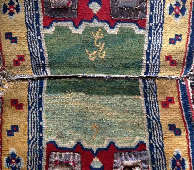 it is not only that it has a fantastic green center field but for many reasons this is a very special tibetan saddle rug. i had for many years only one half  ...