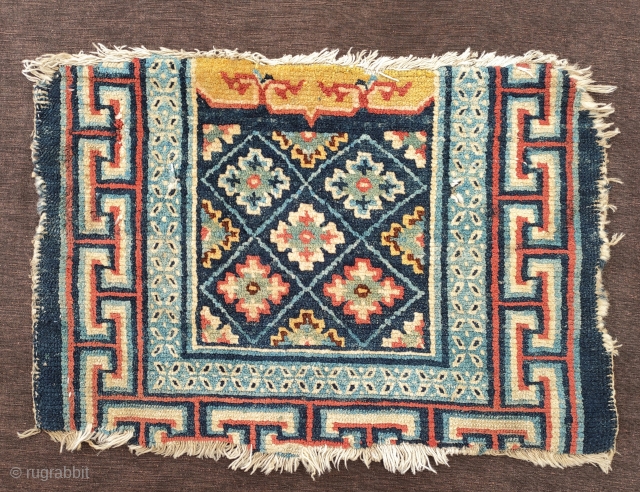 one half of a very unusually small saddle rug 36x 52cm
great naturall colors including a goldish yellow and deep aubergine. super weave and wool not later than late 19th century  detail  ...