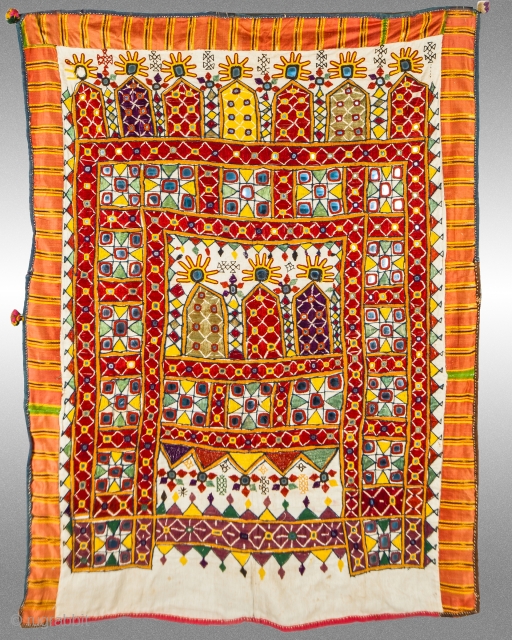 Dharaniyo (Cover for a stack of quilts)
SIZE: 42” x 33”
AGE: 60-80 years old approx.
FROM: Gujarat
NOTE: Detailed embroidery and mirror work highlight this well crafted textile. A border of mashru surrounds the silk  ...