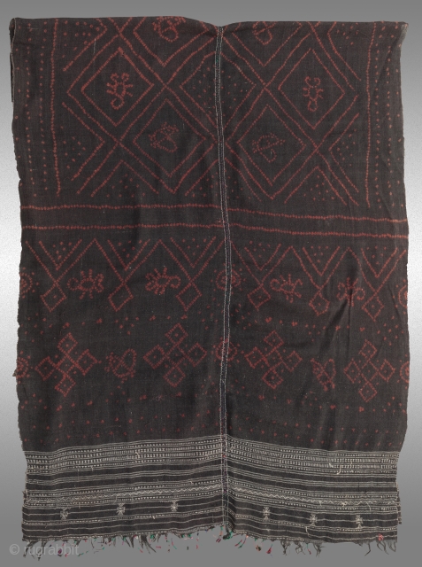 SIZE: 66" x 72"
AGE: 60-70 years old approx.
From: Gujarat

Wool Black Bandhej with Scorpion design colored tassels and embroidery over the center seam. Local hand spun wool and hand-woven by Vankars. Rabari women  ...