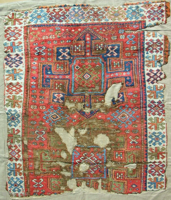 Circa 1800 East Anatolian Kurdish rug fragment. Conserved and mounted on linen. Good pile! Please email: patrickpouler@gmail.com.                