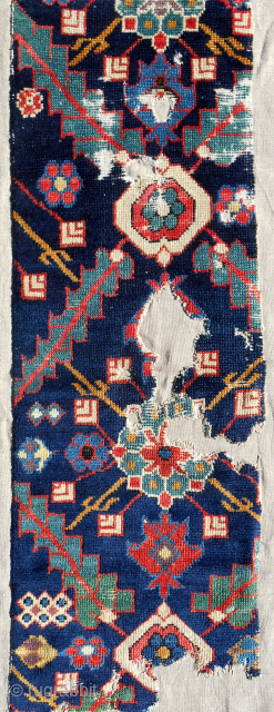 Northwest Persian rug fragment (14" x 40"). 18th c. Mounted on linen. Crazy color. Email: patrickpouler@gmail.com                 