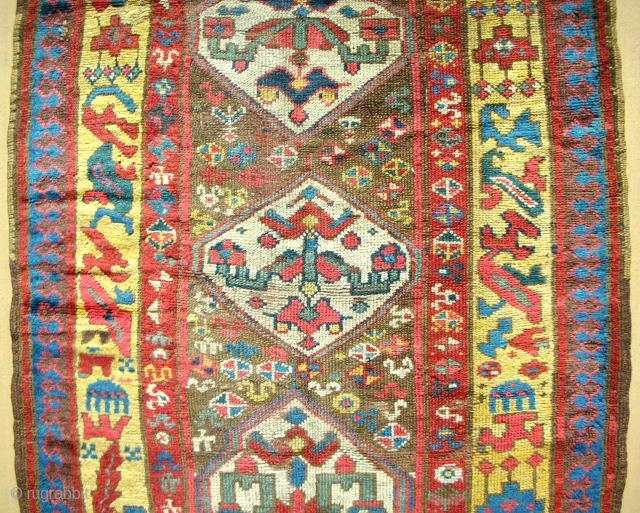 Full pile Persian Kurdish long rug. Playfull drawing with a very cool border. Exceptional color.  Circa 1870.               