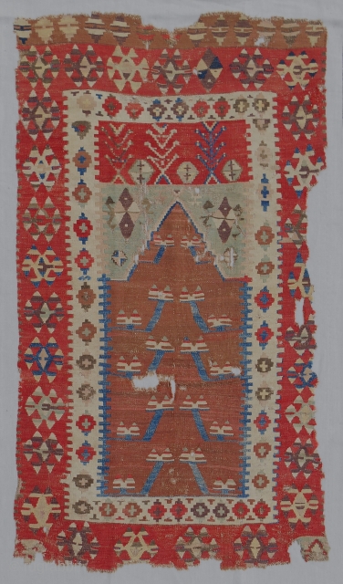 Obruk prayer kilim with excellent color range. Early 19th c. Conserved and mounted on linen. Sublime.                 