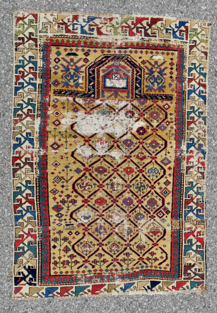 From the Jim Dixon collection- fine, small, canary yellow ground Caucasian Shirvan prayer rug. Maybe a dozen different clear saturated colors. Not your normal "cookie cutter" version. Unique and available. Email: Patrickpouler@gmail.com