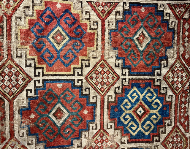 Rare white ground Caucasian Memling gul Moghan rug. 45"x61". Circa 1820-40. All original with selvedges. Brown corrosion. Low silky pile. Email: patrickpouler@gmail.com