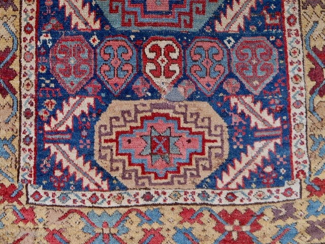 C. 1820-40 NWP Kurdish rug with a Memling gul and serrated leaf design. (39” x 95”) Mostly decent pile. 14 distinct colors including an old aubergine and true camel wool. Original kilim  ...