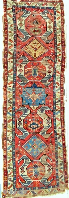 Extraordinary and whimsical Shahsavan long rug from the Moghan plain. Lenkoran design. Marvellous color. Reasonable condition with some obvious issues.  Mid 19th c. or older.       