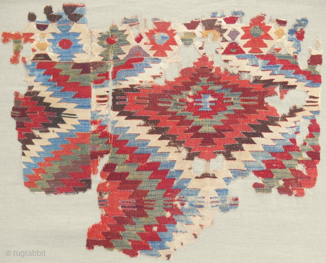18th c. Central Anatolian kilim fragment. Professionally mounted on linen.                       