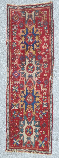 Early Kazak rug fragment (25” x 78”). Circa 1820-40 with Leshgi star design. Fine. Complete field.                 