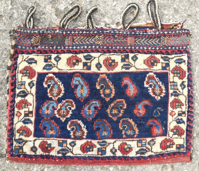Small Afshar complete bag with small, rare "flaming botehs" and fancy enclosures. All original. Circa 1880.                 
