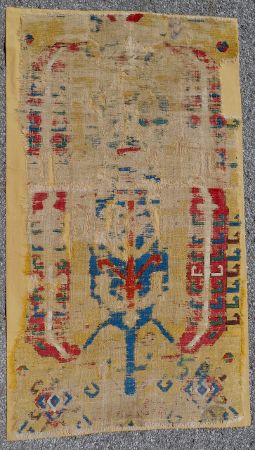 Extraordinarily rare 17-18th c. Central Anatolian rug fragment. Mounted on yellow linen. About 3.5 x 5.5ft.                 