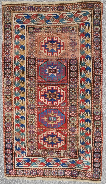 Memling gul design Caucasian Moghan rug (4x8ft) circa 1870. Decent condition with brown corrosion. Please email: patrickpouler@gmail.com                