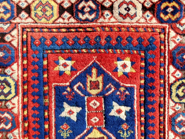 150 year old Kazak or Gendje large rug fragment (detail) with absolute full, original pile. Conserved and professionally mounted on linen.            