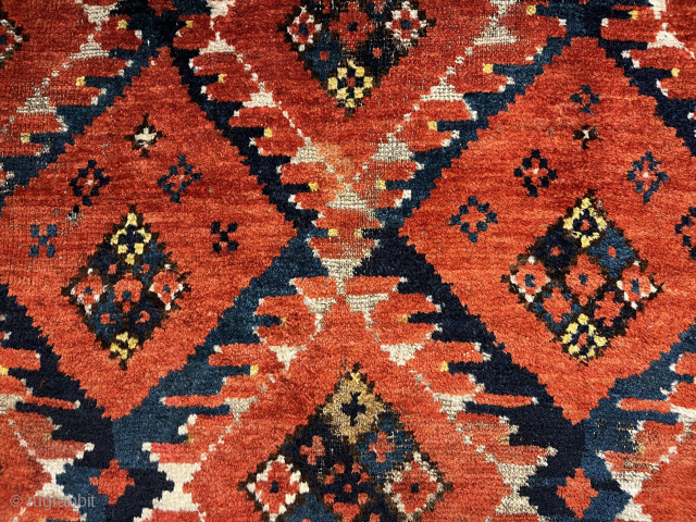 Lurid, bright red Ersari rug (51 x 60"). Detail. Mid 19th c. Mostly good pile. Charming and whimsical design. Have never seen another. The colors are much better than the rugrabbit ...