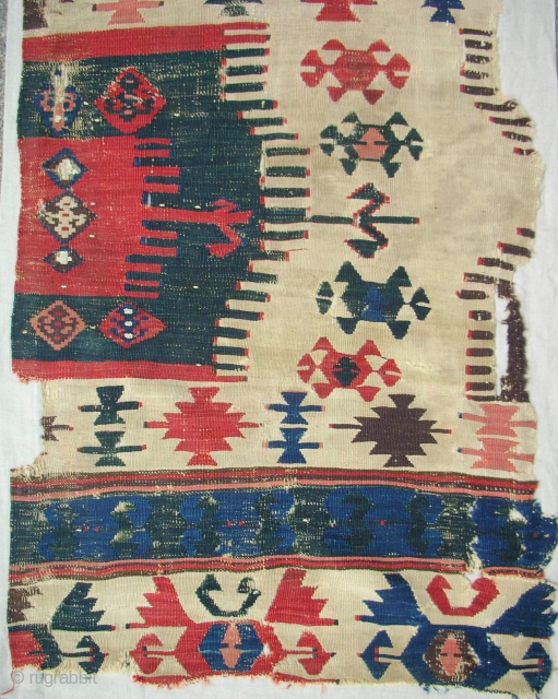 C. 1800 central Anatolian kilim panel. Conserved and mounted on linen.                      