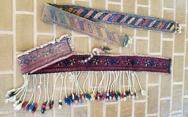 Animal trappings or cinch bands.
Pile construction.
All original tassels.
Quashgai or Bakhtiari.
Found in southwest Persia (Shiraz).
Lengths are 65 inches and 56 inches.
             