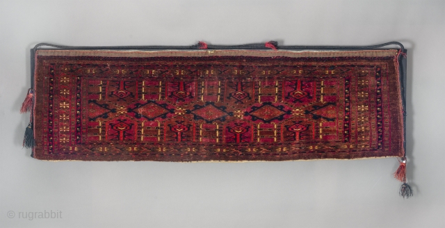 Antique Turkmen Saryk Torba Face.
Intact with no damage.
Original braided ties.
14” wide by 45” long.
                   