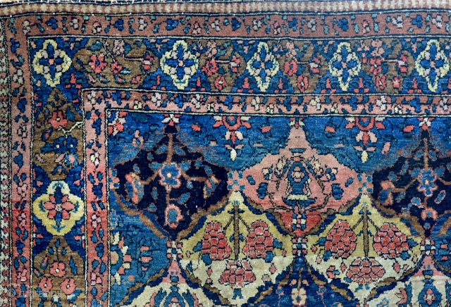 Old Bakhtiari rug. It has a line of abrash and a small tear in the middle. Supple wool and very nice, saturated colors, difficult to get them photographed correctly. 
The rug has  ...