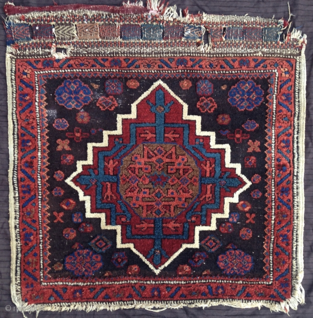 Bagface with Mamluk star design, possibly Ersari (c.f. Nagel auction 7 september 2010 lot 283), or yes, Sirdjan Afshar/Baluch.

70x67 cm             