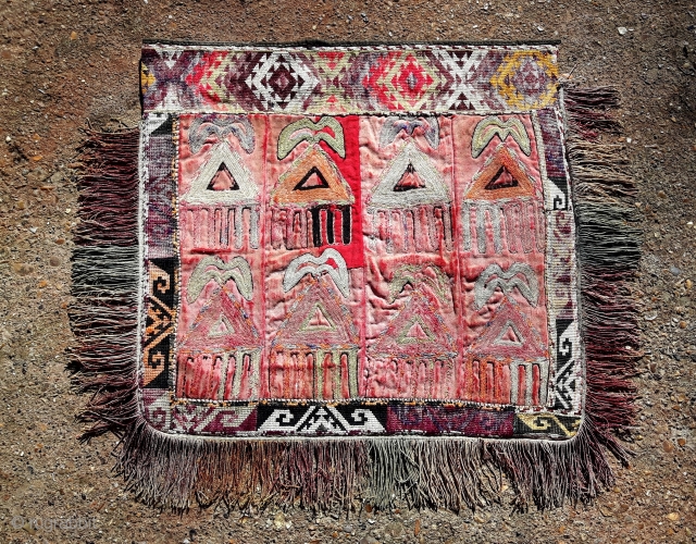 Uzbek lali posh embroidered food cover.

I found this in a batch of rugs I bought recently and know nothing about these except that they are very sweet. 

35cm x 32cm   