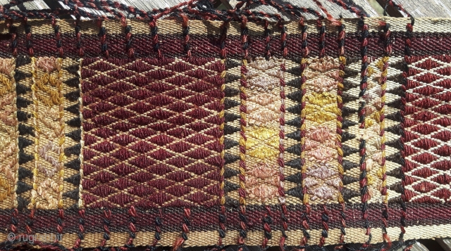 Nice tent band with its tassels and most of its fringy bits intact. Colors faded and mellow. A really great piece of weaving in what I think is called inlaid brocade (plain  ...