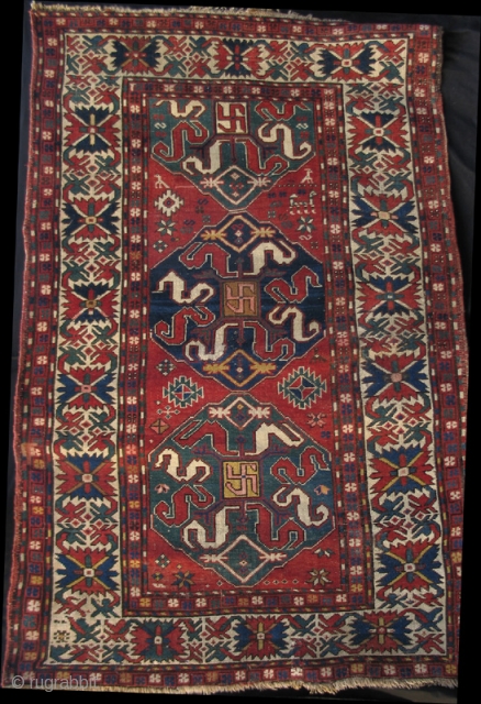 Chondoresk/Cloudband rug from the 3rd or 4th quarter of the 19th century.
Good colors with a prominent and refined border.
(i.e. Dimesions 4'0" X 6'6"          