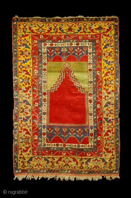 "Tulip" Ladik prayer rug, Turkey, Konya region, 1850-1880, wool on wool, 200x135 cm, 5 borders (!) made out of wonderful yellows (a pastel one until the middle of the Mihrab and a  ...