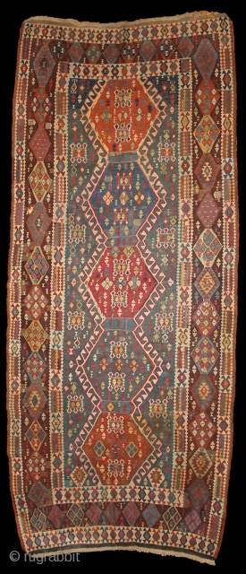 Kagizman Kilim, mid. 19th century, East Anatolia, 365x150cm
Beautiful saturated natural colors. Rare triple-bordure type. Wool on wool, some oxidized browns here and there, good overall condition.
more pictures here: https://picasaweb.google.com/pazyrikcarpet
Feel free to ask  ...