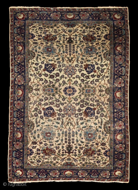 Kayseri "Manchester" rug, wool on cotton, very fine knotting with soft, silky touch. Very characteristic "Shah abbas" field design The cream-ivory ground makes the movement of the leaves and flowers dynamic and  ...