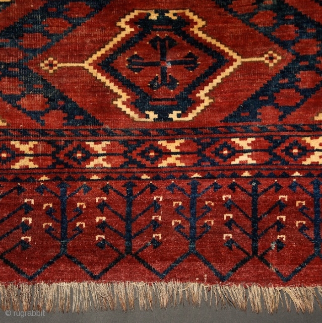 Ersari 'ikat' chuval, 19th century, 150x100 cm, almost intact condition, some small wear in the upper end otherwise full, meaty pile overall. 3 floating cross-medallions in a tremolous, deep field. Clear, archaic  ...