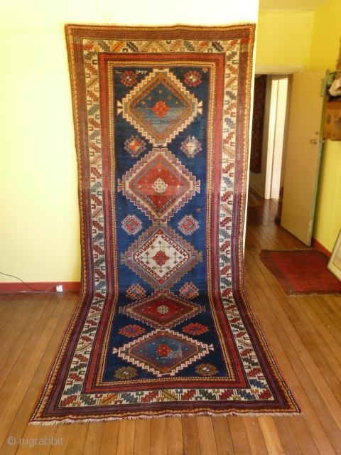 Antique Kazak Long Rug Dated 1904
3.67m x 1.52cm (12ft 0.5 inches x  5ft)
Great Condition with two very well executed small reknotted areas.
PRICE: Aust$1950 for Export
Aust$2145 including GST for Australian Buyers.
  