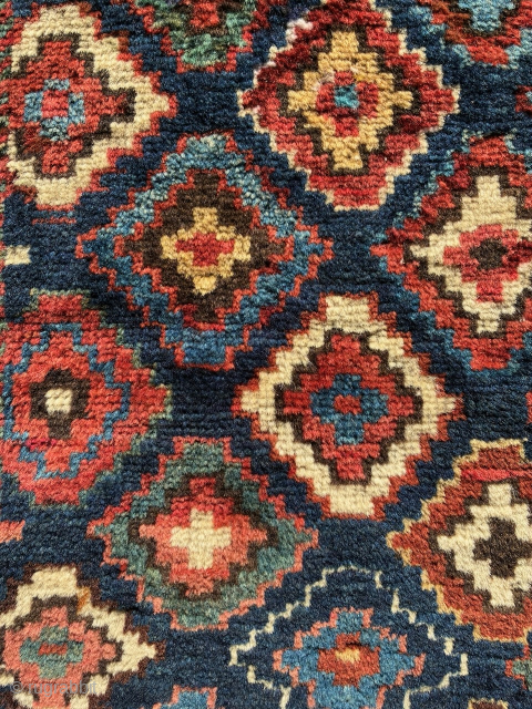 North west persian pile bag face, 54 x 52 cm. Email: peparethos@xsmail.com