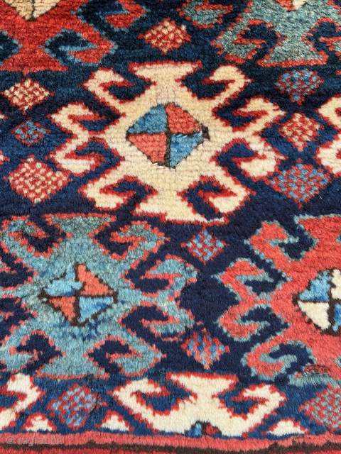 North west Persian pile bag face, mounted, 63 x 57 cm. Email: peparethos@xsmail.com