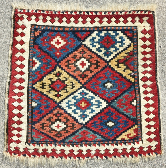 Caucasian Kuba bag face with a 'Jaf' design. Smashing color! Part of our exhibition, 'Artful Weavings'.

Collection of Mr. and Mrs. Bruce Baganz.

Inv# 17761, size= 1'8"x1'8"        