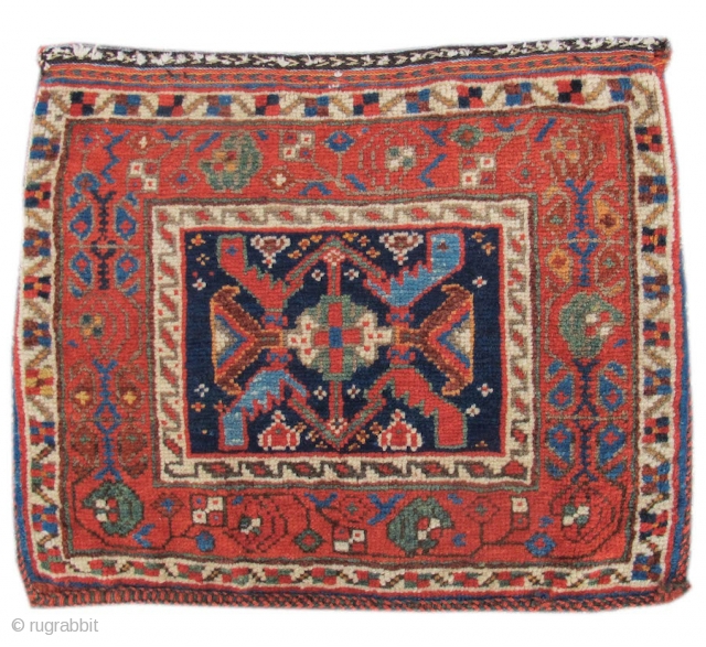 Colorful old Afshar chanteh, complete bag.


size= 1'4" x 1'1", Inv# 17405 

Collection of Mr. and Mrs. John Corwin.               