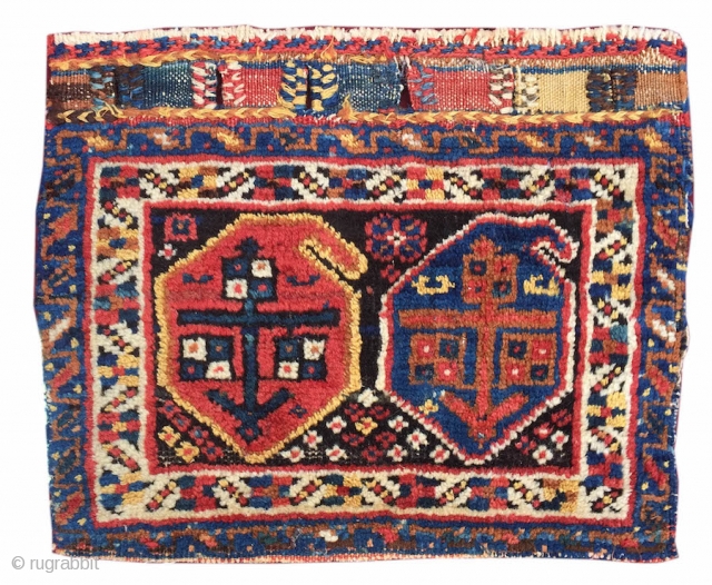 Afshar or Luri chanteh. This soft colorful bag face once served as the outside panel of a small personal bag, or 'chanteh'. A pair of 'boteh' paisleys are drawn in madder red  ...