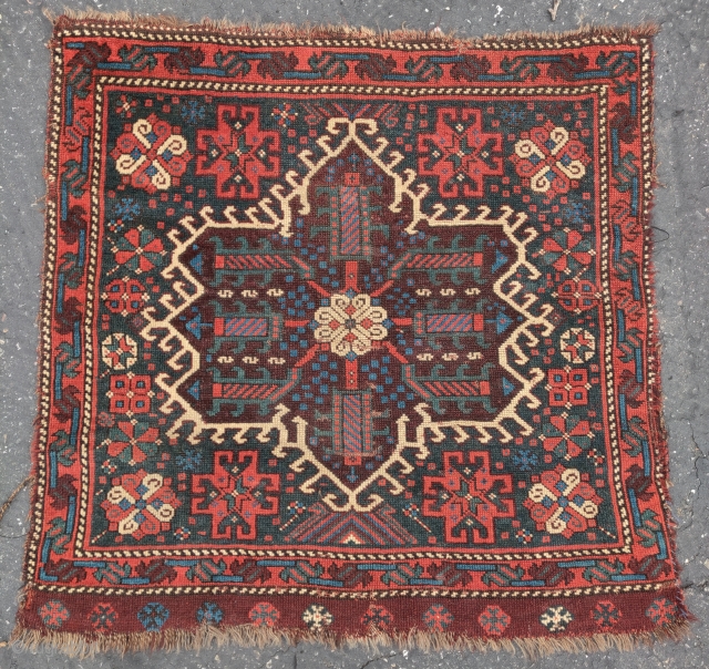 Iconic Luri south Persian bagface. This group has a very Baluch-esque feel to them. 2'6"x2'6". All natural dyes.
               