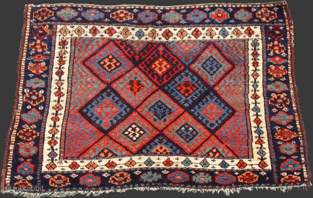 Jaff Kurd Bagface, Northwest Persia, 4th quarter of the 19th cen. 2'9'' x 3'10'' Thick lustrous pile and saturated natural colors. The extension of the barber pole minor border into the larger  ...