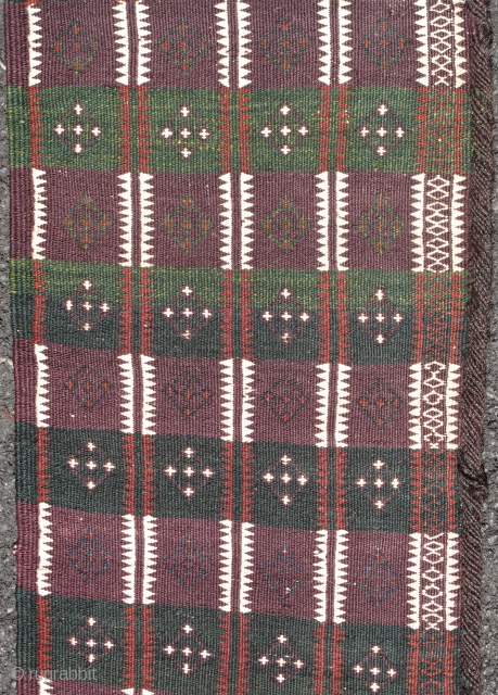 Baluch Flatwoven Trapping, southwestern Pakistan, early 20th century.
A minority of Baluch weavings can actually be attributed to Balochistan proper. This long trapping woven finely with floating weft technique is expertly dyed with  ...