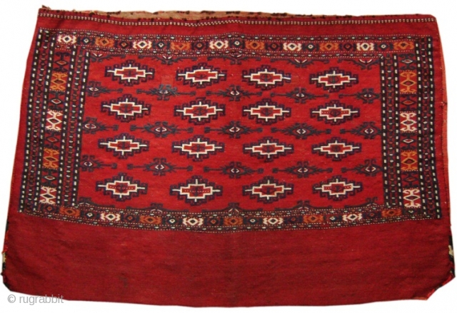 This flatwoven complete tent bag exemplifies the Turkmen love for madder red. Though probably woven in the early twentieth century the spacing of the field elements recalls the proportions of earlier weavings.  ...