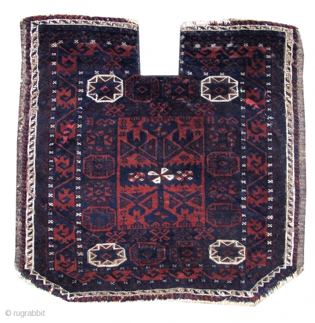 Baluch saddle cover, c. 1900. size= 2'0"x2'0". Excellent original condition other than slight visible wear on the edges from use as a saddle.          